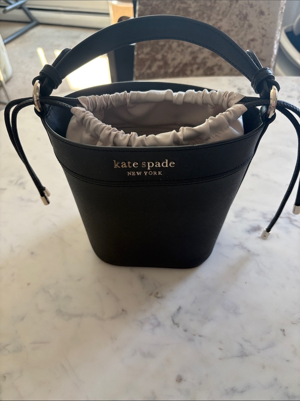 kate spade New York Black Leather Bucket Shoulder Bag with Cream Drawstring